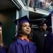 A graduate looks out into EMU's Convocation Center as she marches out during the start of Pioneer's 2013 graduation ceremony, Thursday, June 6.
Courtney Sacco I AnnArbor.com 